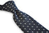navy tie with white squared polka dot design
